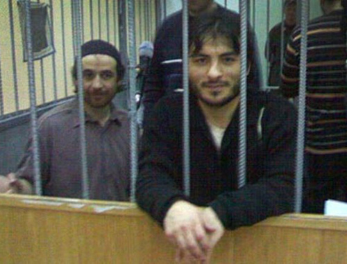 Defendants in case of attack on Nalchik in the courtroom. Rasul Kudaev is in the centre. Photo: http://www.echo.msk.ru/blog/kavkaz_politic/850563-echo/ Defendants in case of attack on Nalchik in the courtroom. Rasul Kudaev is in the centre. Photo: http://www.echo.msk.ru/blog/kavkaz_politic/850563-echo/