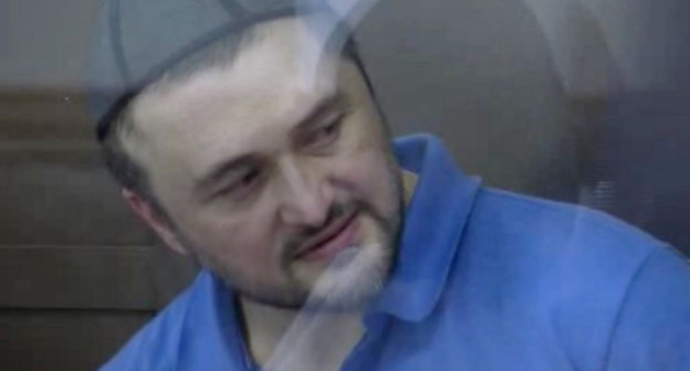 Rustam Makhmudov at the court session at the Moscow City Court on the case of the murder of journalist Anna Politkovskaya, June 4, 2013. Photo shot from video record of the court trial, http://mosgorsud.ru/ Rustam Makhmudov at the court session at the Moscow City Court on the case of the murder of journalist Anna Politkovskaya, June 4, 2013. Photo shot from video record of the court trial, http://mosgorsud.ru/
