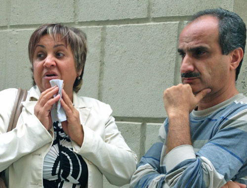 Wife and brother of Hilal Mamedov - Bakhar Mamedova and Imran Mamedov after verdict announcement. Baku, September 27, 2013. Photo by Parvana Bayramova for the "Caucasian Knot" Wife and brother of Hilal Mamedov - Bakhar Mamedova and Imran Mamedov after verdict announcement. Baku, September 27, 2013. Photo by Parvana Bayramova for the "Caucasian Knot"