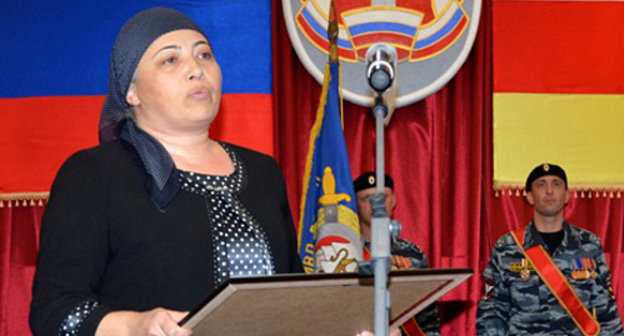 Zalina Berezova, mother of the perished Police Lieutenant Zaur Djibilov, receives a posthumous award for the son. North Ossetia, Vladikavkaz, November 8, 2013. Photo by Dmitry Tamerlanov for the "Caucasian Knot" Zalina Berezova, mother of the perished Police Lieutenant Zaur Djibilov, receives a posthumous award for the son. North Ossetia, Vladikavkaz, November 8, 2013. Photo by Dmitry Tamerlanov for the "Caucasian Knot"