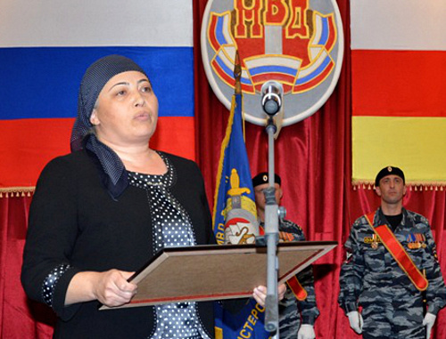 Zalina Berezova, mother of the perished Police Lieutenant Zaur Djibilov, receives a posthumous award for the son. North Ossetia, Vladikavkaz, November 8, 2013. Photo by Dmitry Tamerlanov for the "Caucasian Knot" Zalina Berezova, mother of the perished Police Lieutenant Zaur Djibilov, receives a posthumous award for the son. North Ossetia, Vladikavkaz, November 8, 2013. Photo by Dmitry Tamerlanov for the "Caucasian Knot"