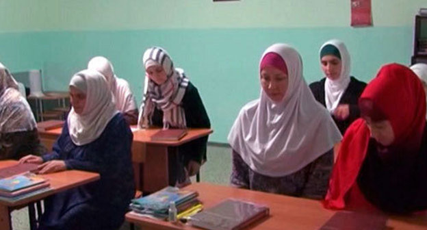 Students of Islamic courses organised by the religious group "As-Salam" at the lectures in madrasa. Stavropol, November 2013. Screenshot of a video report of Islamic information portal Islam.ru Students of Islamic courses organised by the religious group "As-Salam" at the lectures in madrasa. Stavropol, November 2013. Screenshot of a video report of Islamic information portal Islam.ru