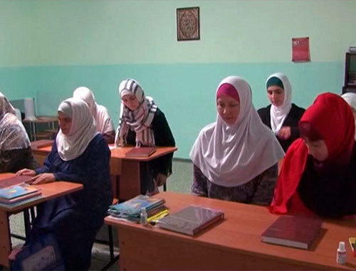 Students of Islamic courses organised by the religious group "As-Salam" at the lectures in madrasa. Stavropol, November 2013. Screenshot of a video report of Islamic information portal Islam.ru Students of Islamic courses organised by the religious group "As-Salam" at the lectures in madrasa. Stavropol, November 2013. Screenshot of a video report of Islamic information portal Islam.ru