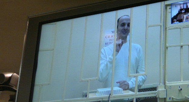 Yusup Temerkhanov, sentenced in a high security colony, takes part in the court session in the case of murdering Yuri Budanov via video conference. Moscow, Russia's Supreme Court, December 4, 2013. Photo by the "Caucasian Knot" Yusup Temerkhanov, sentenced in a high security colony, takes part in the court session in the case of murdering Yuri Budanov via video conference. Moscow, Russia's Supreme Court, December 4, 2013. Photo by the "Caucasian Knot"