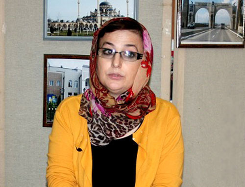 Satsita Israilova, director of the Central City Library. Photo by the Chechen Republic government Committee on Tourism, http://www.chechentourism.ru/ Satsita Israilova, director of the Central City Library. Photo by the Chechen Republic government Committee on Tourism, http://www.chechentourism.ru/