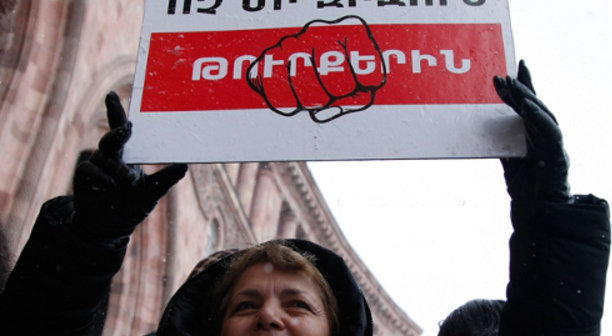Participant of a rally demanding that Turkey should recognize the Armenian Genocide. Yerevan, December 12, 2013. Photo PanARMENIAN Photo/Karo Sahakyan Participant of a rally demanding that Turkey should recognize the Armenian Genocide. Yerevan, December 12, 2013. Photo PanARMENIAN Photo/Karo Sahakyan