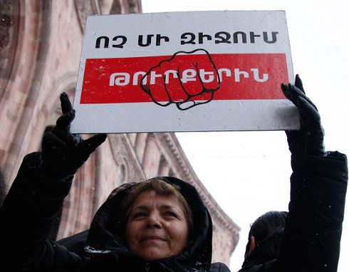 Participant of a rally demanding that Turkey should recognize the Armenian Genocide. Yerevan, December 12, 2013. Photo PanARMENIAN Photo/Karo Sahakyan Participant of a rally demanding that Turkey should recognize the Armenian Genocide. Yerevan, December 12, 2013. Photo PanARMENIAN Photo/Karo Sahakyan