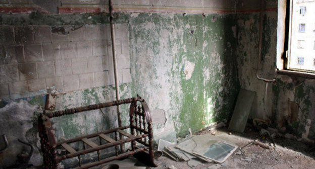 One of the damaged flats on the 7th floor of the house destroyed during the warfare in August 2008. South Ossetia, Tskhinvali, December 2, 2013. Photo by Mariya Kotaeva for the "Caucasian Knot" One of the damaged flats on the 7th floor of the house destroyed during the warfare in August 2008. South Ossetia, Tskhinvali, December 2, 2013. Photo by Mariya Kotaeva for the "Caucasian Knot"