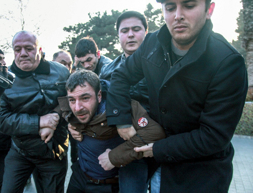 Police detains youth activists at the protest action in Baku on December 29, 2013. Photo by Aziz Karimov for the "Caucasian Knot" Police detains youth activists at the protest action in Baku on December 29, 2013. Photo by Aziz Karimov for the "Caucasian Knot"