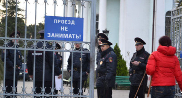 Police troops at St.Michael’s Cathedral. Sochi, January 7, 2014. Photo by Svetlana Kravchenko for the ‘Caucasian Knot’. Police troops at St.Michael’s Cathedral. Sochi, January 7, 2014. Photo by Svetlana Kravchenko for the ‘Caucasian Knot’.
