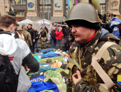 Maidan defenders paying tribute to their perished comrades. Kiev, February 21, 2014. Photo: Jeroen Akkermans, RTL News Berlin Maidan defenders paying tribute to their perished comrades. Kiev, February 21, 2014. Photo: Jeroen Akkermans, RTL News Berlin