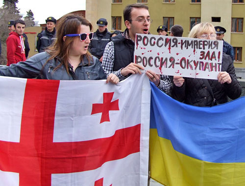 Participants of a protest action against TV Bridge with Russia. Tbilisi, March 28, 2014. Photo by Edita Badasyan for the "Caucasian Knot" Participants of a protest action against TV Bridge with Russia. Tbilisi, March 28, 2014. Photo by Edita Badasyan for the "Caucasian Knot"