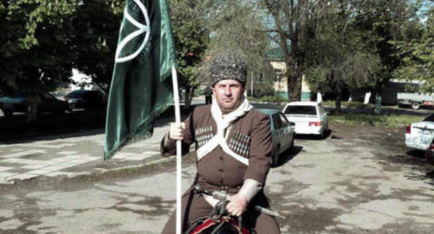 Participant of the horse march dedicated to the 57th anniversary of the return of deported Karachay people to their historic homeland. Karachay-Cherkessia, the Kuban Region, village Znamenka, May 3, 2014. Photo by Kemal Urusov and Artur Baychorov for the "Caucasian Knot: Participant of the horse march dedicated to the 57th anniversary of the return of deported Karachay people to their historic homeland. Karachay-Cherkessia, the Kuban Region, village Znamenka, May 3, 2014. Photo by Kemal Urusov and Artur Baychorov for the "Caucasian Knot: