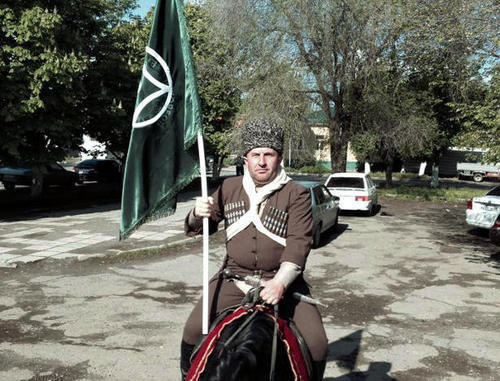 Participant of the horse march dedicated to the 57th anniversary of the return of deported Karachay people to their historic homeland. Karachay-Cherkessia, the Kuban Region, village Znamenka, May 3, 2014. Photo by Kemal Urusov and Artur Baychorov for the "Caucasian Knot: Participant of the horse march dedicated to the 57th anniversary of the return of deported Karachay people to their historic homeland. Karachay-Cherkessia, the Kuban Region, village Znamenka, May 3, 2014. Photo by Kemal Urusov and Artur Baychorov for the "Caucasian Knot: