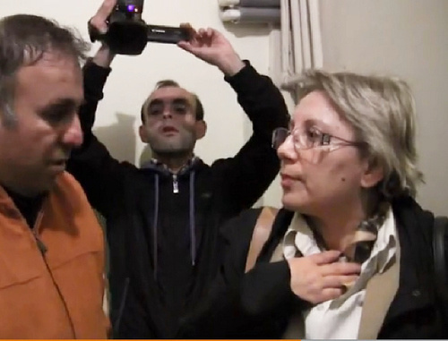 Human rights activist Leyla Yunus, director of the Institute for Peace and Democracy, being detained. Baku, April 28, 2014. Screenshot from video taken by Radio Azadlyg, Copyright 2014 RFE/RL. Human rights activist Leyla Yunus, director of the Institute for Peace and Democracy, being detained. Baku, April 28, 2014. Screenshot from video taken by Radio Azadlyg, Copyright 2014 RFE/RL.