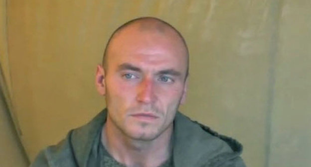 Russian serviceman, detained on the territory of Ukraine, August 25, 2014. Screenshot from the video posted by Youtube user IC. Russian serviceman, detained on the territory of Ukraine, August 25, 2014. Screenshot from the video posted by Youtube user IC.