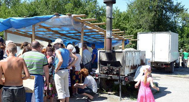 Refugees camp in Rostov Region. August 2014. Photo by Oleg Pchelov for the ‘Caucasian Knot’. Refugees camp in Rostov Region. August 2014. Photo by Oleg Pchelov for the ‘Caucasian Knot’.