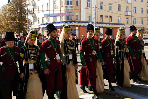 Participants of the Sixth International Festival of Adyg (Circassian) Culture marching in the streets of Maikop. October 2, 2014. Photo by the press service of the Ministry for Culture of Adygea https://www.facebook.com/groups/685045851584727/photos