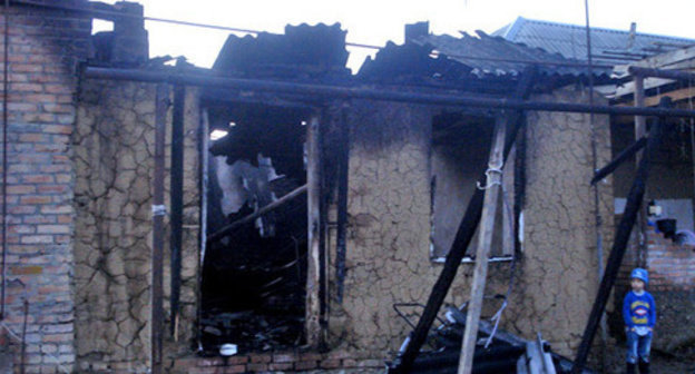 House burned down by law enforcers in the village of Yandi, Achkhoi-Martan District, December 7 2014. Photo provided by the HRC "Memorial" press-service. House burned down by law enforcers in the village of Yandi, Achkhoi-Martan District, December 7 2014. Photo provided by the HRC "Memorial" press-service.