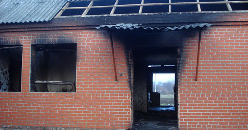 House burned down by law enforcers in the village of Yandi, Achkhoi-Martan District, December 7 2014. Photo provided by the HRC "Memorial" press-service. House burned down by law enforcers in the village of Yandi, Achkhoi-Martan District, December 7 2014. Photo provided by the HRC "Memorial" press-service.