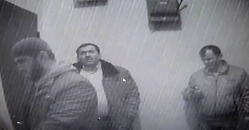 Strangers at the office of the Joint Mobile Group (JMG). Grozny, December 13, 2014. Screenshot of a video by the user Sergey Babinets http://www.youtube.com/ Strangers at the office of the Joint Mobile Group (JMG). Grozny, December 13, 2014. Screenshot of a video by the user Sergey Babinets http://www.youtube.com/