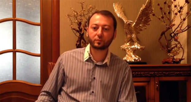 Magomed Khazbiev. Screenshot from video ‘Message of Magomed Khazbiev to the Ingush people about trip to Chechnya’, http://www.youtube.com/watch?v=g_WgxGtBDJg#t=255 Magomed Khazbiev. Screenshot from video ‘Message of Magomed Khazbiev to the Ingush people about trip to Chechnya’, http://www.youtube.com/watch?v=g_WgxGtBDJg#t=255
