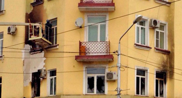 The building where the office of the Joint Mobile Group of the Committee against Torture (CaT) is located, after the fire. Grozny, December 14, 2014. Photo by Akhmed Aldebirov for the "Caucasian Knot".