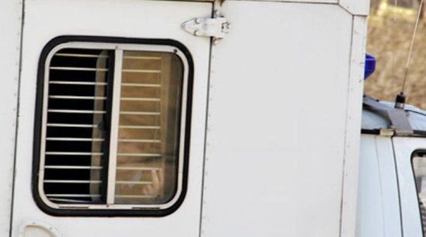 The defendants in the case against the BORN in the prisoner transport vehicle. Moscow, March 18, 2015. Photo by Magomed Tuaev for the "Caucasian Knot"