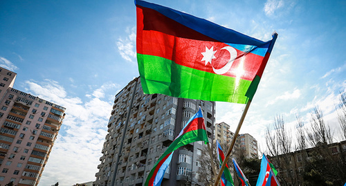 The flag of Azerbaijan. Photo by Aziz Karimov for the "Caucasian Knot" The flag of Azerbaijan. Photo by Aziz Karimov for the "Caucasian Knot"