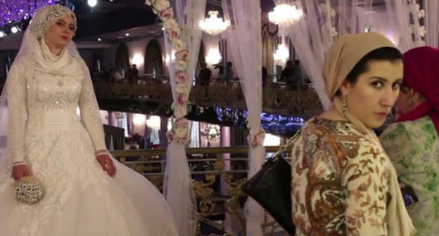 Wedding of the chief of the ROVD of the Nozhai-Yurt District of Chechnya with a 17-year-old girl. Grozny, May 16, 2015. Screenshot of a video by the user Caucasian Policy https://www.youtube.com/watch?v=2xpRgf28g90