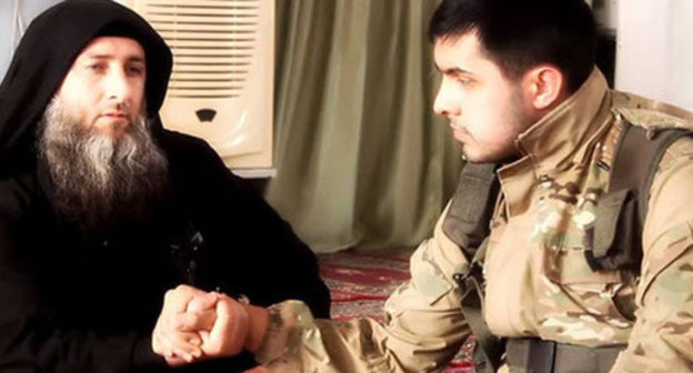Dagestani preacher Nadir Abu Khalid (right) and Abu Jihad. Screenshot from the video posted by user kazim samu, http://www.youtube.com/watch?v=LC_SB4cGcl0 Dagestani preacher Nadir Abu Khalid (right) and Abu Jihad. Screenshot from the video posted by user kazim samu, http://www.youtube.com/watch?v=LC_SB4cGcl0