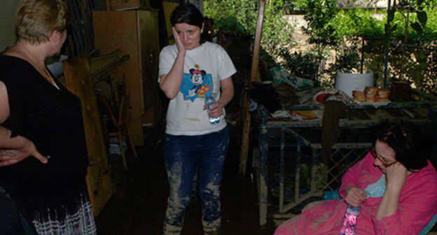 The Dzadzamiya family suffered from the flooding. Photo by Beslan Kmuzov for the "Caucasian Knot"