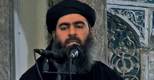 Abu Bakr al-Baghdadi, leader of "Islamic State" recognized as a terrorist organization in a number of countries. Sreenshot from the video posted by user islam guraba, http://www.youtube.com/watch?v=D3fZWDgoRic 