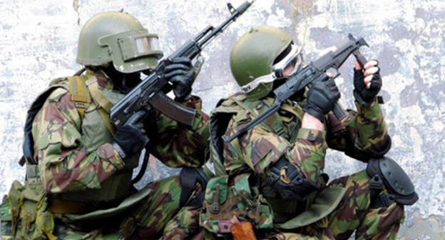 Law enforcers during special operation. Photo: http://nac.gov.ru/nakmessage/2014/07/11/v-khode-spetsoperatsii-v-tsumadinskom-raione-dagestana-neitralizovany-dva-band.html