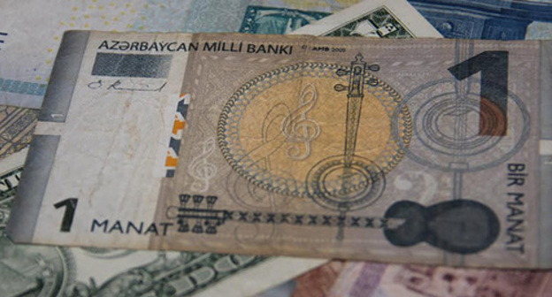 Azerbaijani manat and foreign currencies. Photo by Magomed Magomedov