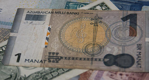Azerbaijani manat and foreign currencies. Photo by Magomed Magomedov