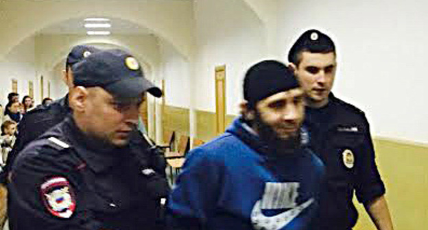 Zaur Dadaev convoyed to the courtroom of the Basmanny Court of Moscow. March 8, 2015. Photo by Yuliya Buslavskaya for the "Caucasian Knot"