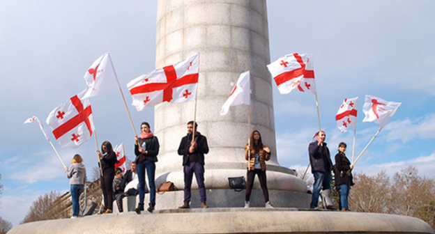 Georgian flags at the rally in Tbilisi, April 2015. Photo by Beslan Kmuzov for the "Caucasian Knot". Georgian flags at the rally in Tbilisi, April 2015. Photo by Beslan Kmuzov for the "Caucasian Knot".