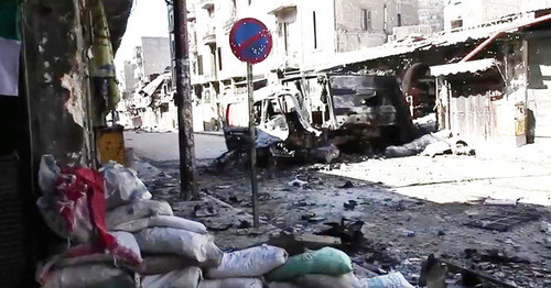 A street in Aleppo after battle. Photo: Voice of America News: Scott Bobb reports from Aleppo, Syria https://ru.wikipedia.org