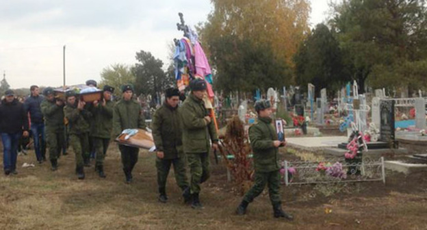 Burial of Vadim Kostenko. Photo: Sergey Khazov-Kassiya, RFE/ RL, http://www.svoboda.org/content/article/27332224.html Burial of Vadim Kostenko. Photo: Sergey Khazov-Kassiya, RFE/ RL, http://www.svoboda.org/content/article/27332224.html