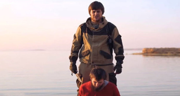 Screenshot of a video of the organization "Islamic State", banned in Russia, which showed the execution of a man introduced as a native of Grozny, who collaborated with the secret services. Screenshot of a video by the user BNO News http://www.youtube.com/ Screenshot of a video of the organization "Islamic State", banned in Russia, which showed the execution of a man introduced as a native of Grozny, who collaborated with the secret services. Screenshot of a video by the user BNO News http://www.youtube.com/