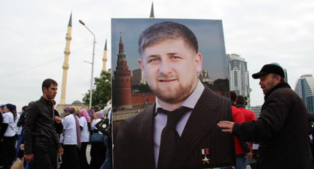 Portrait of Ramzan Kadyrov at the rally in Grozny. Photo by Magomed Magomedov for the ‘Caucasian Knot’. Portrait of Ramzan Kadyrov at the rally in Grozny. Photo by Magomed Magomedov for the ‘Caucasian Knot’.