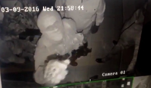 Attackers on the JMG office in Ingushetia. Screenshot of a video from the surveillance camera published in Dmitry Utukin's Twitter, Twitter.com/U2_Keen Attackers on the JMG office in Ingushetia. Screenshot of a video from the surveillance camera published in Dmitry Utukin's Twitter, Twitter.com/U2_Keen