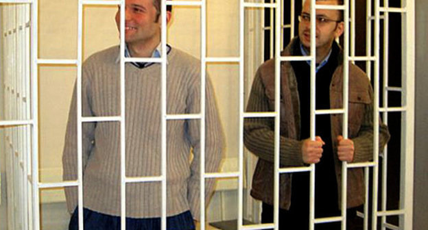 Convicted Emin Milli and Adnan Gadjizade. Photo by www.azadliq.org Convicted Emin Milli and Adnan Gadjizade. Photo by www.azadliq.org