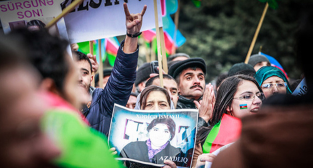 Rally participant holds portrait of political prisoner Khadija Ismayilova, Baku, March 15, 2015. Photo by Aziz Karimov for the ‘Caucasian Knot’ Rally participant holds portrait of political prisoner Khadija Ismayilova, Baku, March 15, 2015. Photo by Aziz Karimov for the ‘Caucasian Knot’