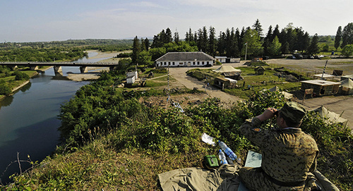 Border guard at the Georgian-Abkhazian border. Photo: © Sputnik/ Mikhail Mordasov, http://sputnik-georgia.ru/incidents/20160522/231788973.html Border guard at the Georgian-Abkhazian border. Photo: © Sputnik/ Mikhail Mordasov, http://sputnik-georgia.ru/incidents/20160522/231788973.html