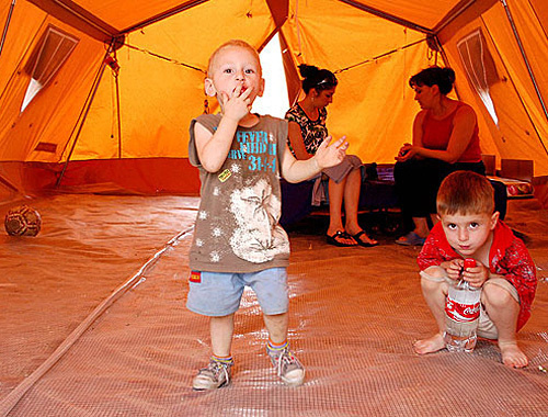 Tent camp of refugees from South Ossetia in Gori. Georgia, September 2008. Photo: Interpressnews/http://civil.ge Tent camp of refugees from South Ossetia in Gori. Georgia, September 2008. Photo: Interpressnews/http://civil.ge
