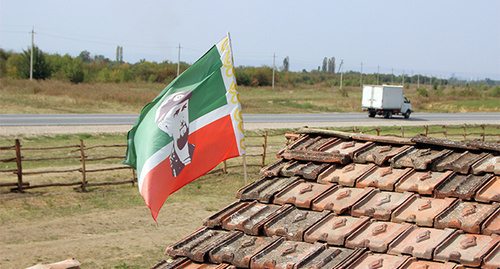 A flag on the roof of one of the houses in an ethnographic village "Shira-Yurt". Part 2. Photo report by the "Caucasian Knot" correspondent Magomed Magomedov A flag on the roof of one of the houses in an ethnographic village "Shira-Yurt". Part 2. Photo report by the "Caucasian Knot" correspondent Magomed Magomedov