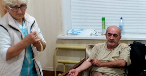 Doctors providing help to a hunger-striker Gerey Sadykov. Buynaksk, October 11, 2016. Photo by Patimat Makhmudova for the "Caucasian Knot" Doctors providing help to a hunger-striker Gerey Sadykov. Buynaksk, October 11, 2016. Photo by Patimat Makhmudova for the "Caucasian Knot"