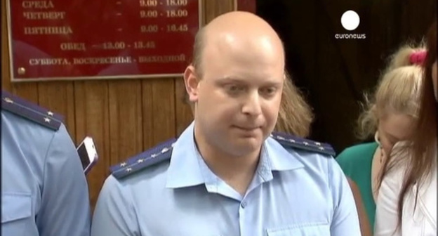 Public prosecutor Mikhail Reznichenko. Photo: screenshot of a video http://wildred.tv/news/mir/277201/